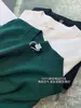 Blusa de Tricô Premium Marca C Fio Alto Algodão Puro Amiga da Pele Soltinha Modeladora Elegante Gola Redonda Manga Curta para Mulheres 093