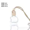 Botellas de aromaterapia para coche en stock en varios estilos con correas para colgar, colgantes de botellas de aromaterapia, tapas de madera, botellas difusoras de aceites esenciales de perfume