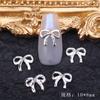 Celebridad de Internet Aleación Arte de Uñas Lazo Pequeño Joyería al por Mayor Estilo Japonés Lujo Ligero Flor de Cinco Pétalos Metal Hueco Decoración de Uñas