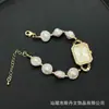 Nuevo Reloj de Dama Palaciego de Moda Europeo y Americano con Diamantes Pulsera de Perlas de Agua Dulce Venta Directa de Fábrica Suministro Transfronterizo