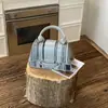 Bolsa feminina com cores contrastantes, de mão, patchwork, bolsa pequena quadrada tecida, novo modelo 2026, com fecho de trava, bolsa de ombro e transversal fashion