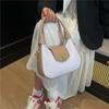 Bolso Pequeño Texturizado de Verano para Axila para Mujer 2026 Nuevo Estilo Patrón Tejido Personalizado Bolso de Media Luna Moda Retro Bolso Cruzado