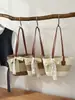 Bolso tote de hombro cruzado exquisito y simple 2026 nuevo diseño de nicho de primavera-verano para mujer, moda de alta gama, para llevar debajo del brazo