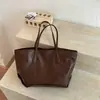 Bolsa tote de cor sólida nicho estilo coreano Shuai Mijia para mulheres, novo modelo 2026, bolsa de mão e bolsa de ombro de grande capacidade na moda para o trabalho