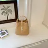 Bolsa de Mão Estilo Coreano da Moda Tipo Balde para Mulheres Verão 2026 Nova Nicho Simples Casual Bolsa de Ombro Transversal Tecida