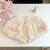 Nuevos shorts de cuadros de burbujas versátiles para niñas con lazo, lindos pantalones de verano para bebés, modernos