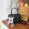 Bolsa de bolinhas de verão transfronteiriça super popular de nicho para mulheres 2026 nova moda versátil bolsa transversal bolsa de mão para o trabalho bolsa feminina