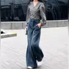 Nueva colección otoño e invierno 2026: Jeans casuales de pierna ancha para mujer, de tiro alto, fluidos, holgados, adelgazantes, en color azul, con corte recto.