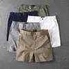 Shorts versátiles de color liso retro americano de longitud de cuarto, de verano casual para hombre, modernos, finos, elásticos, de 4 pulgadas