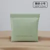Bolsa de metralla cerrada simple mini bolsa de almacenamiento para audífonos de PU color caramelo monedero monedero bolsa de almacenamiento para labiales