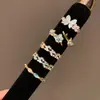 Anillo Abierto de Saturno con Circonita Estilo Coreano Lujo Ligero Moda para el Trabajo Temperamento Anillo para el Dedo Índice Joyería Personalizada de Moda Venta al por Mayor