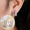 Pendientes de Moda Estilo Europeo Lujo Ligero con Circonita Incrustada en Forma de Corazón Venta Caliente Temperamento de Gama Alta Moda Súper Brillantes Corazón de Melocotón Pendientes Versátiles