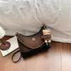 Bolso de hombro de bloque de color de nicho transfronterizo, moderno y elegante, bolso cruzado pequeño estilo Chanel, bolso de hombro con cadena de patrón de diamante de lujo ligero
