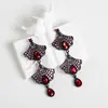 Pendientes Amazon transfronterizos, extragrandes, electrochapados, elegantes, de estilo largo, con un toque de alta gama, adornados con borlas y pedrería negra