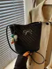 Bolso de hombro con lazo estilo coreano 2026 nuevo de moda para el día a día color liso bolso de axila elegante bolso cruzado tipo cubo