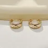 Pendientes retro franceses de moda y tendencia, estilo nicho con un toque de alta gama, versátiles para el uso diario, aros de oreja de lujo ligero
