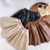 Roupas infantis outono e inverno novo saia infantil para bebês em couro PU saia plissada lisa versátil estilo coreano TW081