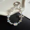 Cadena de Teléfono de Moda Lujo Ligero con Lazo, Perlas y Cristal, Cadena de Mano Corta Estilo Pulsera, Cordón de Teléfono Colgante Anti-Pérdida