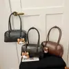 Bolso Almohada Retro Gran Capacidad Bolso de Hombro Único Bolso Axila 2026 Otoño/Invierno Nuevo Estilo Coreano Textura de Moda Bolso de Viaje Bolso para Mujer