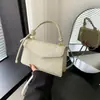Bolso de diseño de nicho nuevo 2026, bolso cruzado moderno y texturizado, bolso versátil para mujer retro y simple, moderno