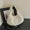 Bolso tote minimalista de estilo coreano con textura de lunares para el hombro para mujer, nuevo modelo 2026, alto valor estético, bolso de mano y bolso de hombro únicos para mujer