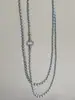 Varios métodos de uso alargaron collar de perlas de vidrio gris jaspeado con hebilla de hierba de la suerte microincrustada cadena de suéter de perlas de moda