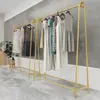 Arara de chão para loja de roupas, arte em ferro, cor dourada, simples, para uso doméstico, específica para quarto, conjunto de araras para pendurar, prateleira para loja de roupas femininas