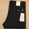 Outono 2020 novo masculino algodão grosso reto slim stretch cor sólida Tencel calças casuais de negócios masculinas