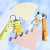 Venta al por mayor del fabricante Llavero de Astronauta de Anime Pvc Goma Blanda Dibujo Animado Colgante de Llave DIY Muñeca 3D Colgante Pequeño