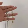 Collar de cuentas geométricas cadena para suéter otoño e invierno acero de titanio no se decolora largo de alta calidad versátil estilo ins collar venta al por mayor