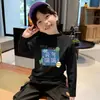 Camiseta Base para Niños 2026 Otoño/Invierno Nuevo Estilo para Niños Versátil de Forro Polar Cálida Capa Interior Cuello Semi-Alto Manga Larga