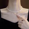 Collar de perlas con colgante de estrella de ojo de gato para mujer, diseño de nicho, 2023, nuevo y elegante collar de clavícula de alta gama.