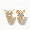 Pendientes de Mariposa Metálicos Huecos de Nuevo Estilo Transfronterizos Europeos y Americanos, Modernos y Sencillos, Artísticos, Delicados, Elegantes y Versátiles para el Uso Diario