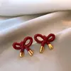 Brincos de laço vermelho retrô femininos 2024 novas explosões brincos diários design nicho cor contraste brincos