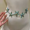 Cadena de Cintura Multicapa de Perlas con Borlas de Flores de Hada Súper Nicho de Alta Gama Elegante Versátil Moda Elegante para Mujer Accesorios de Cintura a Juego