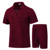 Traje de hombre de manga corta de marca independiente europea y americana, seleccionado cuidadosamente, transfronterizo, con textura de gofre, cuello mao, cremallera pequeña, múltiples bolsillos y color liso