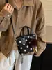 Bolso de mano de lunares de moda transfronterizo para mujer, nuevo bolso cubo de nicho estilo coreano para el día a día, bolso de hombro y cruzado para el día a día
