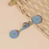 Botón Qipao nuevo estilo nacional chino botón de rana hilo tejido a mano envuelto en hilo bobina de cuenta dorada incienso doble botón cola larga botón de tela de una sola letra accesorios