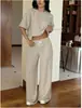 Nuevo conjunto de moda casual de dos piezas para mujer, pantalones de pierna ancha de punto a rayas transfronterizos europeos y americanos, manga corta
