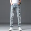 Xintang Roupa Masculina 2025 Verão Novos Jeans Marca de Moda Slim Fit Nove Pontos Perna Stretch Casual Calças Compridas Masculinas