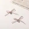 Estilo Doce Cool Sexy Couro Sintético Galvanizado Coração Laço Amarrado à Mão DIY Grampo de Cabelo Feito à Mão Sapatos e Chapéus Acessórios de Vestuário