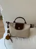 2026 Nuevo Bolso de Hombro Patchwork de Lunares Veraniego Transfronterizo con Estilo y Ambiente Relajado, Bolso de Axila de Viajero de Moda