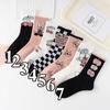 Calcetines calcetines de mujer otoño e invierno nuevo alto valor de color Mori estudiantes deportes desodorante dibujos animados medias japonesas al por mayor