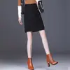 Saia irregular em linha A para mulheres, nova coleção outono 2026, cintura alta, modeladora, saia preta elegante, adequada para o trabalho, e um estilo curto que realça a silhueta