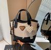 Bolso de mano de color contrastante popular de este año para mujer 2025 nuevo bolso de cubo más vendido versátil casual de alta gama bolso bandolera