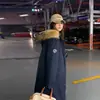 Casaco de plumas longo, acima do joelho, oversized, com gola grande de pelo para mulheres, novo estilo coreano para o inverno de 2026, caimento solto, espesso e estilo workwear moderno