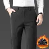 Pantalones casuales de pana de alta gama más vendidos transfronterizos para hombre, otoño e invierno, forrados de polar, corte recto holgado, pantalones de vestir casuales con elasticidad