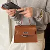 Bolso de Mano Pequeño de Moda y Lujoso para Mujer, Nuevo Bolso Kelly de Viaje con Estampado de Piedra, Bolso Versátil de Hombro y Cruzado, Moderno
