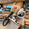 Llavero creativo de simulación de zapatillas de baloncesto AJ de goma blanda, colgante de personalidad, llavero para coche de pareja, bolsa, regalo exquisito
