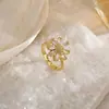Anel Novo Rotativo para Casal Transfronteiriço Anel Feminino de Diamante Zircônia Anel Aberto de Casamento Banhado a Ouro Dominador Versão Coreana Atacado Europeu e Americano